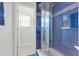 Modern shower with blue tile and glass enclosure at 534 Mclernon Trace, Johns Island, SC 29455