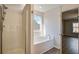 Bathroom with shower, bathtub, and window at 109 Red Leaf Blvd, Moncks Corner, SC 29461