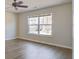 Bright bedroom with large window and hardwood floors at 109 Red Leaf Blvd, Moncks Corner, SC 29461