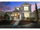 Two-story house with a charming front porch and well-manicured landscaping at 109 Red Leaf Blvd, Moncks Corner, SC 29461