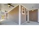 Front porch view with a charming entrance and ceiling fans at 109 Red Leaf Blvd, Moncks Corner, SC 29461