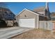 Detached garage with white door and concrete driveway at 109 Red Leaf Blvd, Moncks Corner, SC 29461