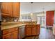 Modern kitchen with stainless steel appliances and wood cabinets at 109 Red Leaf Blvd, Moncks Corner, SC 29461