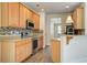 Kitchen with light wood cabinets and stainless steel appliances at 109 Red Leaf Blvd, Moncks Corner, SC 29461