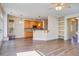 Open living room and kitchen with hardwood floors at 109 Red Leaf Blvd, Moncks Corner, SC 29461