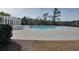 Community pool with spacious deck and surrounding nature at 109 Red Leaf Blvd, Moncks Corner, SC 29461