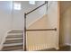 Modern staircase with wood and white railing, leading to the upper level at 109 Red Leaf Blvd, Moncks Corner, SC 29461
