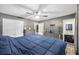 Spacious main bedroom with a large bed, double doors and ensuite bathroom at 110 Swan Dr, Summerville, SC 29485