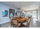 Round dining table with six chairs, located near the kitchen at 113 Claret Cup Way, Charleston, SC 29414
