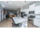 Open concept kitchen with island and stainless steel appliances, overlooking the dining and living areas at 113 Claret Cup Way, Charleston, SC 29414