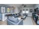 Comfortable living room with built-in shelving and a large TV at 113 Claret Cup Way, Charleston, SC 29414