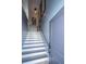 Modern staircase with gray walls and white risers at 113 Claret Cup Way, Charleston, SC 29414