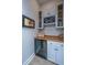 Small wine cellar with wood countertop, wine rack and beverage cooler at 113 Claret Cup Way, Charleston, SC 29414