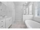 Elegant bathroom with soaking tub and walk-in shower at 117 Wonder Sol Way, Summerville, SC 29485