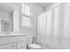 Clean bathroom with white vanity, toilet, and shower with curtain at 117 Wonder Sol Way, Summerville, SC 29485