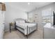 Bright bedroom with a metal bed frame and neutral decor at 117 Wonder Sol Way, Summerville, SC 29485