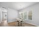 Breakfast nook with table and chairs, hardwood floors and natural light at 117 Wonder Sol Way, Summerville, SC 29485