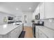 Modern kitchen with stainless steel appliances and white cabinetry at 117 Wonder Sol Way, Summerville, SC 29485