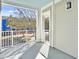 Private balcony with white railings and views of neighborhood at 130 River Landing Dr # 7210, Daniel Island, SC 29492