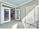 Balcony with access to the living area and exterior at 130 River Landing Dr # 7210, Daniel Island, SC 29492
