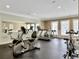 Well-equipped fitness center featuring cardio and weight machines at 130 River Landing Dr # 7210, Daniel Island, SC 29492