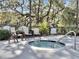 Relax in this community hot tub, nestled under shady trees at 130 River Landing Dr # 7210, Daniel Island, SC 29492