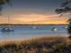 Tranquil waterfront view with sailboats at sunset at 130 River Landing Dr # 7210, Daniel Island, SC 29492
