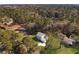 Aerial view of a house with a large backyard and surrounding trees at 1421 Brownswood Rd, Johns Island, SC 29455
