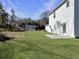 Spacious backyard with grassy area and patio at 1421 Brownswood Rd, Johns Island, SC 29455