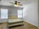 Light and airy bedroom with ceiling fan and neutral decor at 1421 Brownswood Rd, Johns Island, SC 29455