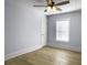 Bright bedroom featuring light gray walls and wood-look flooring at 1421 Brownswood Rd, Johns Island, SC 29455