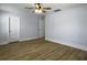 Spacious bedroom with ceiling fan and light wood flooring at 1421 Brownswood Rd, Johns Island, SC 29455