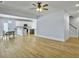 Open concept dining room and kitchen with hardwood floors at 1421 Brownswood Rd, Johns Island, SC 29455