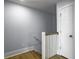 Upper level stairwell with white railings and light walls at 1421 Brownswood Rd, Johns Island, SC 29455