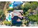 Top-down view of home with solar panels, pool, and surrounding trees at 1563 Headquarters Plantation Dr, Johns Island, SC 29455