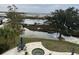 Spacious backyard with patio, hot tub, and marsh views at 1563 Headquarters Plantation Dr, Johns Island, SC 29455