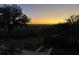 Stunning sunset view from backyard patio, overlooking marsh at 1563 Headquarters Plantation Dr, Johns Island, SC 29455