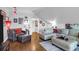 Spacious bonus room, featuring a sectional sofa and hardwood floors at 1563 Headquarters Plantation Dr, Johns Island, SC 29455