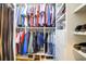 Well-organized closet with ample hanging space and shelving at 1563 Headquarters Plantation Dr, Johns Island, SC 29455