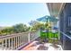 Deck overlooking marsh views with table and chairs at 1563 Headquarters Plantation Dr, Johns Island, SC 29455