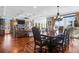 Elegant dining room with hardwood floors and a view to the living room at 1563 Headquarters Plantation Dr, Johns Island, SC 29455