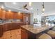 Kitchen with granite counters, wood cabinets and island at 1563 Headquarters Plantation Dr, Johns Island, SC 29455