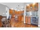 Kitchen with wood cabinetry, granite countertops, wine cooler at 1563 Headquarters Plantation Dr, Johns Island, SC 29455