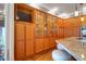 Kitchen with wood cabinets, granite counters and island at 1563 Headquarters Plantation Dr, Johns Island, SC 29455
