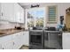 Bright laundry room, featuring granite countertops and modern LG washer and dryer at 1563 Headquarters Plantation Dr, Johns Island, SC 29455