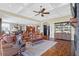 Open living room with hardwood floors and a view to the kitchen at 1563 Headquarters Plantation Dr, Johns Island, SC 29455