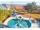 Inviting pool and spa with expansive patio and tranquil views at 1563 Headquarters Plantation Dr, Johns Island, SC 29455