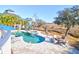 Large kidney-shaped pool with patio and seating area at 1563 Headquarters Plantation Dr, Johns Island, SC 29455