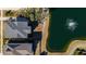 Aerial view of house and backyard with a pond at 1646 Red Tide Rd, Mount Pleasant, SC 29466