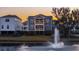 Home's back elevation with water fountain, showcasing luxurious outdoor space at 1646 Red Tide Rd, Mount Pleasant, SC 29466